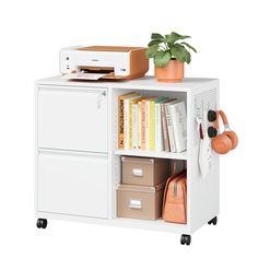 a white bookcase with two drawers and a printer on the top shelf next to it