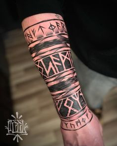 a person with a tattoo on their arm