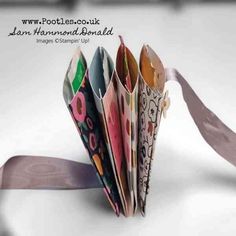 an origami book is folded up and ready to be used as a decoration