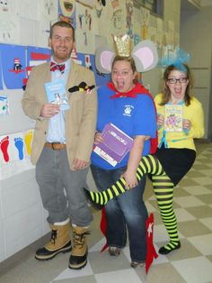 three people dressed up in costumes standing next to each other