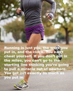 a woman running down a road with a quote on it that says, running is just you