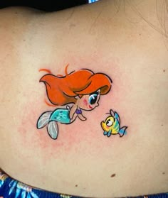 the little mermaid has a fish on her back