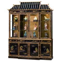 an antique china cabinet with figurines on it