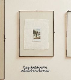 three framed photographs hanging on the wall with words below them that read, the photos you've collected over two years