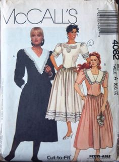 two women's dresses, one in black and the other in white