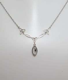 "This is a new handmade necklace. It is made with antiqued silver plated Celtic knots, accented with a high quality CRYSTAL CLEAR glass jewel that sparkles like crystal. Decorated portion is 2 1/2\" wide and 1 1/4\" tall in the center. Necklace is adjustable 15-18\" with a lobster clasp and chain extender. If you would like a different length, please send us a message. Matching earrings and headpiece are listed in our store in a variety of stone colors. If you don't see items with a color you wa Celtic Goddess, Choker Pendant, Celtic Knots, Chain Extenders, Wedding Jewellery Necklace, Wedding Necklaces, Necklace Choker, Necklace Dainty, Custom Bracelets