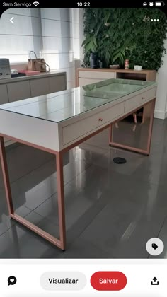 a table with glass top in the middle of a room