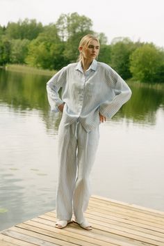 Look fashionable and feel comfortable at home. Launil pajamas are designed not to restrict, to be free, to provide comfort.  Mija linen long sleeve shirt and pant set. Made using 100% softened linen with a vertical striped design from a lightweight fabric. Trousers with elastic waist and adjustable draws. The shirt closes with river shell buttons at the front. WHY THIS ITEM SO AMAZING?   Our commitment to you is not only about how we sew, but also how you will feel wearing our products. We strive to make this product, which we sew, not only of high quality, but also your favorite. For this we use only the highest quality softened linen and extremely high quality Gütermann sewing threads. This ensures not only a long-lasting sewing result, but also your comfort and pleasure when wearing our Linen Sleepwear, Womens Pyjama Sets, Pajama Robe, Shirt And Pants, Womens Loungewear, Style Expert, Pajamas Women, Stripes Design, Linen Shirt