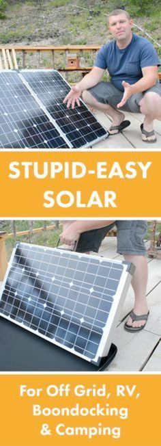 two men are setting up solar panels on the ground, and one man is pointing at them