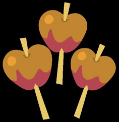 three pieces of apple sitting on top of each other with sticks sticking out of them