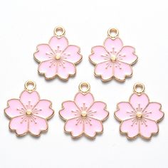 pale pink enamel sakura flower charm Pale gold tone alloy base. choose from a set of 2 or a set of 5 Approximately 20.5mm x 17mm x 1.5mm   hole size 2mm Not suitable for children postage will only be applied to the first item in the basket: Sakura Necklace, Rose Gold Flower, Jewelry Making Earrings, Sakura Flower, Sakura Cherry Blossom, Making Earrings, Pink Blossom, Pink Enamel, Love Charms