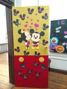 a door decorated with mickey and minnie mouses