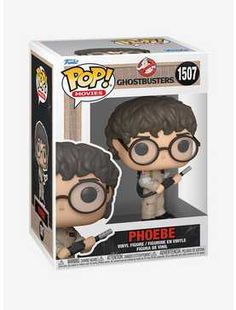 the harry potter pop vinyl figure is in its box and has glasses on it's head