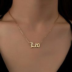 Leo Name Necklace, Leo Script Necklace, Leo Zodiac Necklace, Leo Sign Gift, Leo Name Necklace, Leo Old English Necklace, Leo Gift Jewelry Elevate your gifting with our exquisite Personalized Name Necklace, a stunning piece of custom Gold Gothic jewelry. Crafted with meticulous attention to detail, this necklace is more than just an accessory - it's an expression of individuality and elegance. Featuring a dainty Old English initial pendant in radiant gold, this necklace becomes a cherished treasu Leo Name, Leo Core, Leo Zodiac Necklace, Leo Necklace Zodiac, Leo Necklace, Pink Wallpaper Hello Kitty, Script Necklace, Leo Sign, Zodiac Necklace