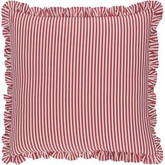 a red and white striped pillow with ruffled edges