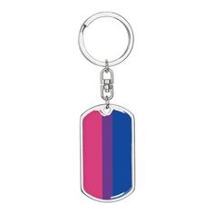 a keychain with a rainbow design on the front and bottom part of it