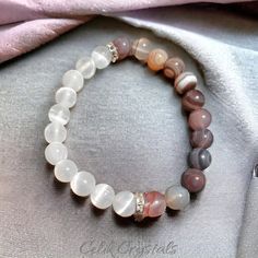 Standard Size Is 7.5 Inches. Message Me If You Would Like Any Size Between 6.5 - 8.5 Inches. -Introducing The Botswana Agate, Selenite Bracelet - A Mesmerizing Piece Of Jewelry Designed To Enhance Your Spiritual Well-Being. Crafted From Natural Stones With 8mm Stretch Beads, This Bracelet Is Not Only A Stunning Fashion Accessory But Is Also Believed To Have Spiritual Healing Properties. -The Bracelet Features Botswana Agate And Selenite Stones That Are Known By Many For Their Ability To Promote White Agate Gemstone Bracelets, White Agate Spiritual Stretch Bracelet, White Agate Bracelets With 8mm Beads, Selenite Bracelet, Bracelet Stones, Selenite Stone, Stunning Fashion, Bracelets Design, Botswana Agate