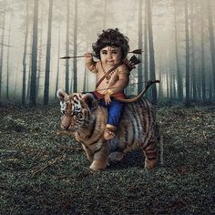 an image of a child riding on the back of a tiger with words good morning