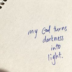 a note with writing on it that says, my god turns darkness into light