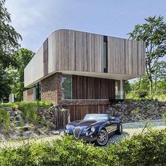 a car is parked in front of a house