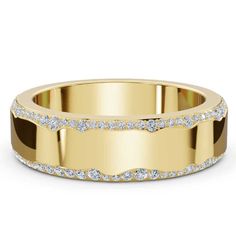 a yellow gold wedding band with white diamonds