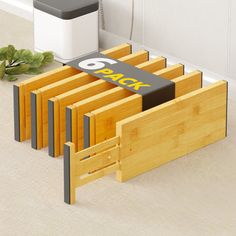 a bunch of wooden drawers sitting on top of a floor