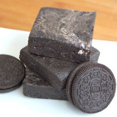 three oreo cookies are stacked on top of each other