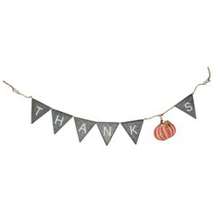 a thank banner with an orange and white striped ball hanging from it's side