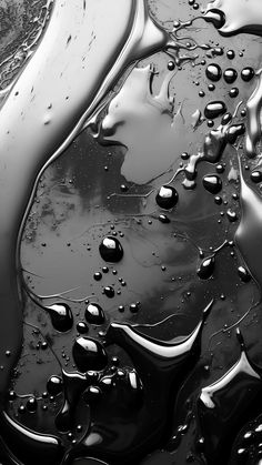 black and white photograph of water droplets