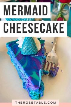 a piece of mermaid cheesecake on a plate with a fork