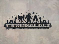 an embroidered cross stitched logo with people holding hands and the words, minnesota crystal club