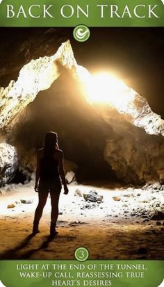 a woman standing in front of a cave with the words back on track above her