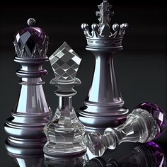 three glass chess pieces are shown on a reflective surface