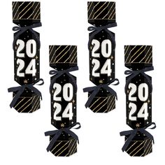 four black and gold numbers are tied to each other with ribbon around the numbers on them