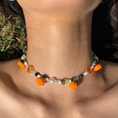 🎃 Chunky autumn choker necklace with pumpkins 🎃 Adjustable length (13-15 inches). Made from glass, plastic beads, and silver hardware. Autumn Seed Bead Necklace, Autumn Beaded Necklace, Pumpkin Beads Jewellery Gold, Halloween Orange Round Bead Jewelry, Bead Pumpkin, Pumpkin Beads Necklace, Pumpkin Necklace, Plastic Beads, Silver Hardware