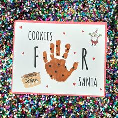 there is a card that says cookies f r santa with a handprint on it