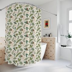 a white bath tub sitting next to a shower curtain