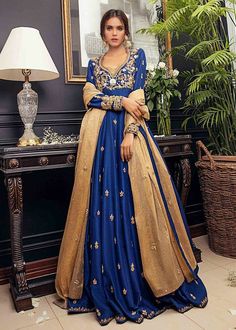 ✨Beautiful and elegant blue anarkali suit for all size women, silk long Anarkali,sequens hand work  anarkali ,plus size wedding floor length anarkali.  Coblet blue floor length hand work embroidered Anarkali,it has beautiful embroidery of sequin, zardozi, and zari over the front and small motifs all over the front and back flair.  It has gold orgenza dupatta with small motifs all over.  ✨This dress can be customise in any other colour and in all size, please contact us regarding any changes if you want.We will make this dress as per your choice. ✨Please note that this outfit is not a replica of low quality. We make garment on the order of our customers.we don't make it in bulk, This will be exclusively made for you and we give out best to make outfit look unique.  ✨We use high quality fabr Blue Floor-length Gown For Eid, Floor-length Anarkali Set For Eid, Floor-length Anarkali Dola Silk Sharara, Floor-length Dola Silk Anarkali Set With Pallu, Anarkali Floor-length Raw Silk Churidar, Gold Anarkali Floor-length Churidar, Anarkali Style Dola Silk Floor-length Sharara, Gold Anarkali Churidar Floor-length, Maxi Length Raw Silk Anarkali Set With Zari Work