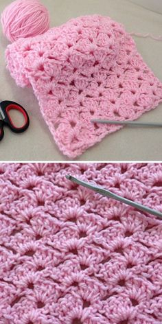 crocheted pink blanket with scissors and yarn