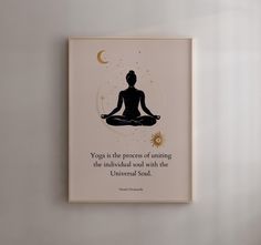 a poster on the wall with a buddha saying yoga is the process of aiming the individual soul with the universal soul