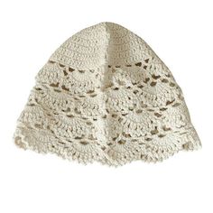 a white crocheted hat on a white background