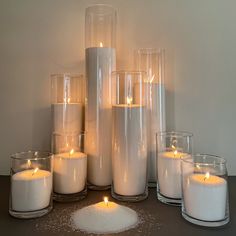 a group of candles sitting next to each other