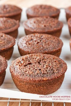 chocolate muffins on a cooling rack ready to be baked into the oven for consumption