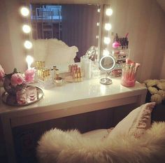 an image of a vanity with lights on it