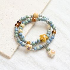 Category: Jewelry Material: Mixed Material Fashion Element: Bell, Fu Character Style: Cute Chinese Bracelet, Sugar Bears, Twin Beads, Mulberry Tree, Lock Style, New Chinese Style, Gold Bracelets, New Chinese, Ceramic Ornaments