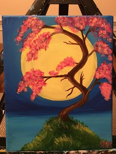 a painting of a tree with pink flowers on it