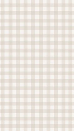 a white and beige checkered wallpaper pattern