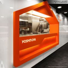 an orange and white wall with the words yoshirova on it