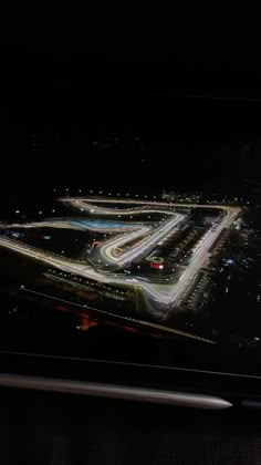 an aerial view of the airport at night