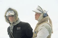 two women in winter gear standing next to each other